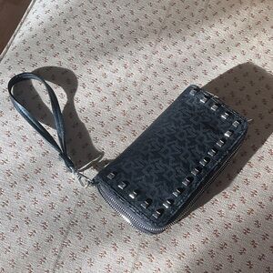 Stylish DKNY Black Wristlet with Silver Accents